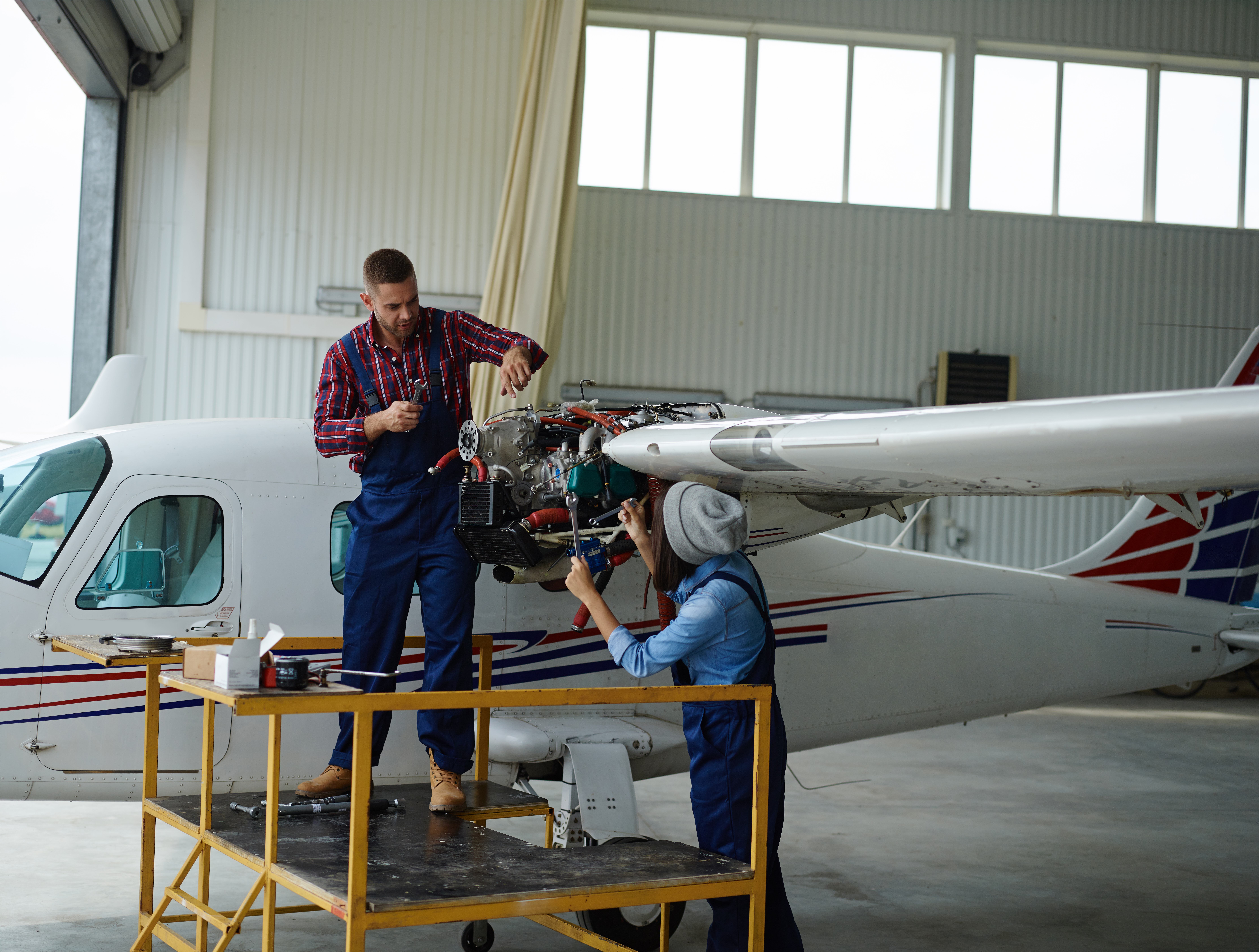 Aviation maintenance engineer working on an aircraft